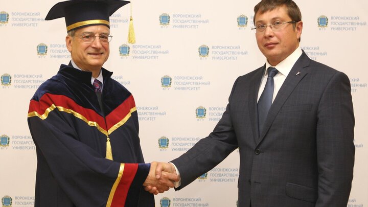 Anthony Starace receiving honorary degree from Prof. Dmitry A. Yendovitsky
