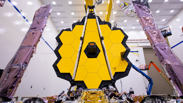 Set to launch on Dec. 18, NASA’s James Webb Space Telescope will allow scientists to investigate the universe in the infrared, a band of light invisible to the human eye.